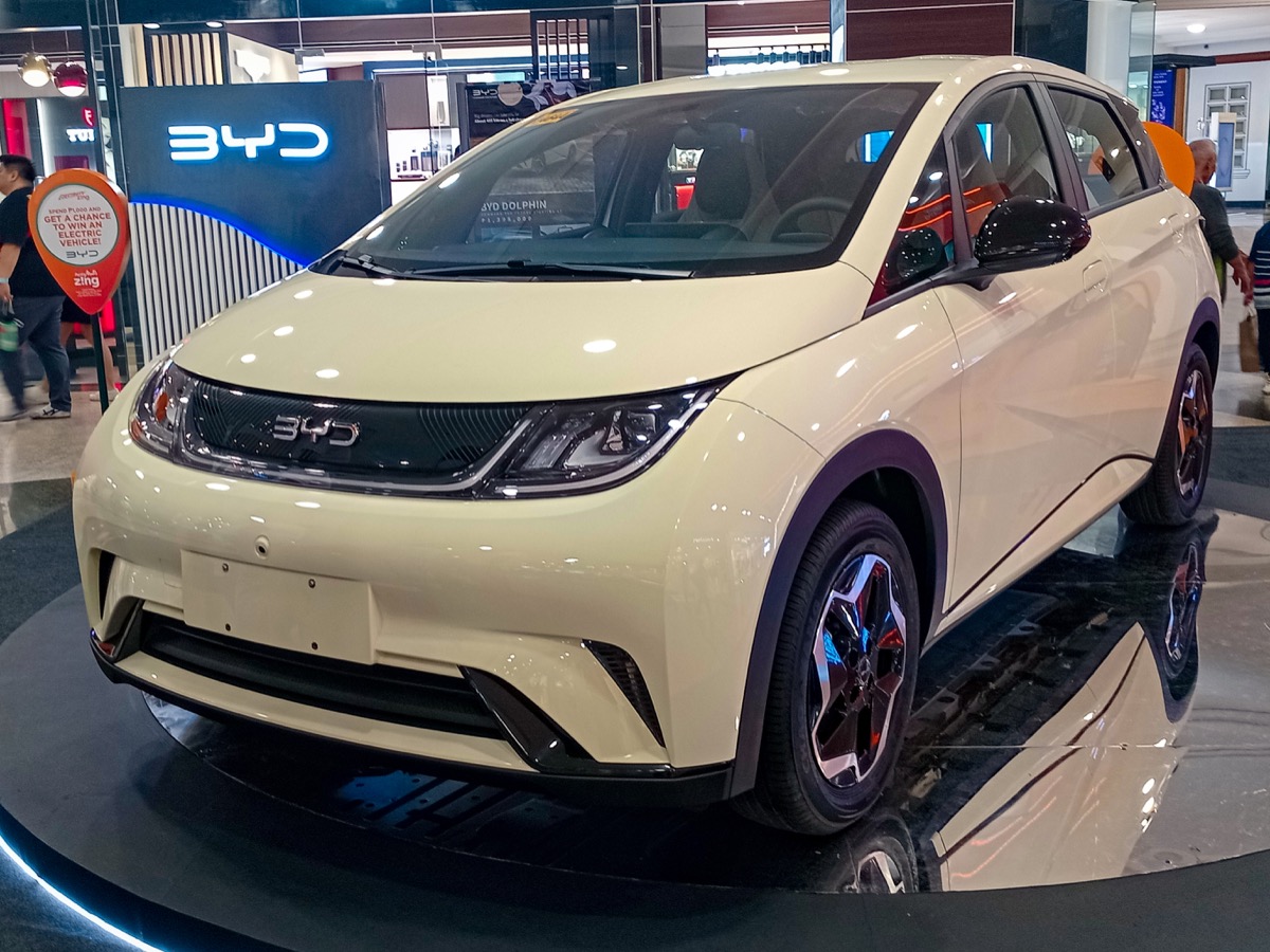 BYD Dolphin Cream White front left view showing exterior design and proportions