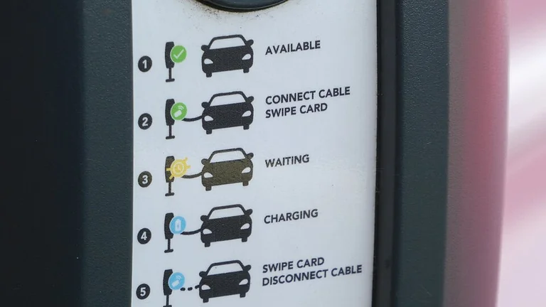 EV charging station detail showing CCS connector and charging point for commercial EV business