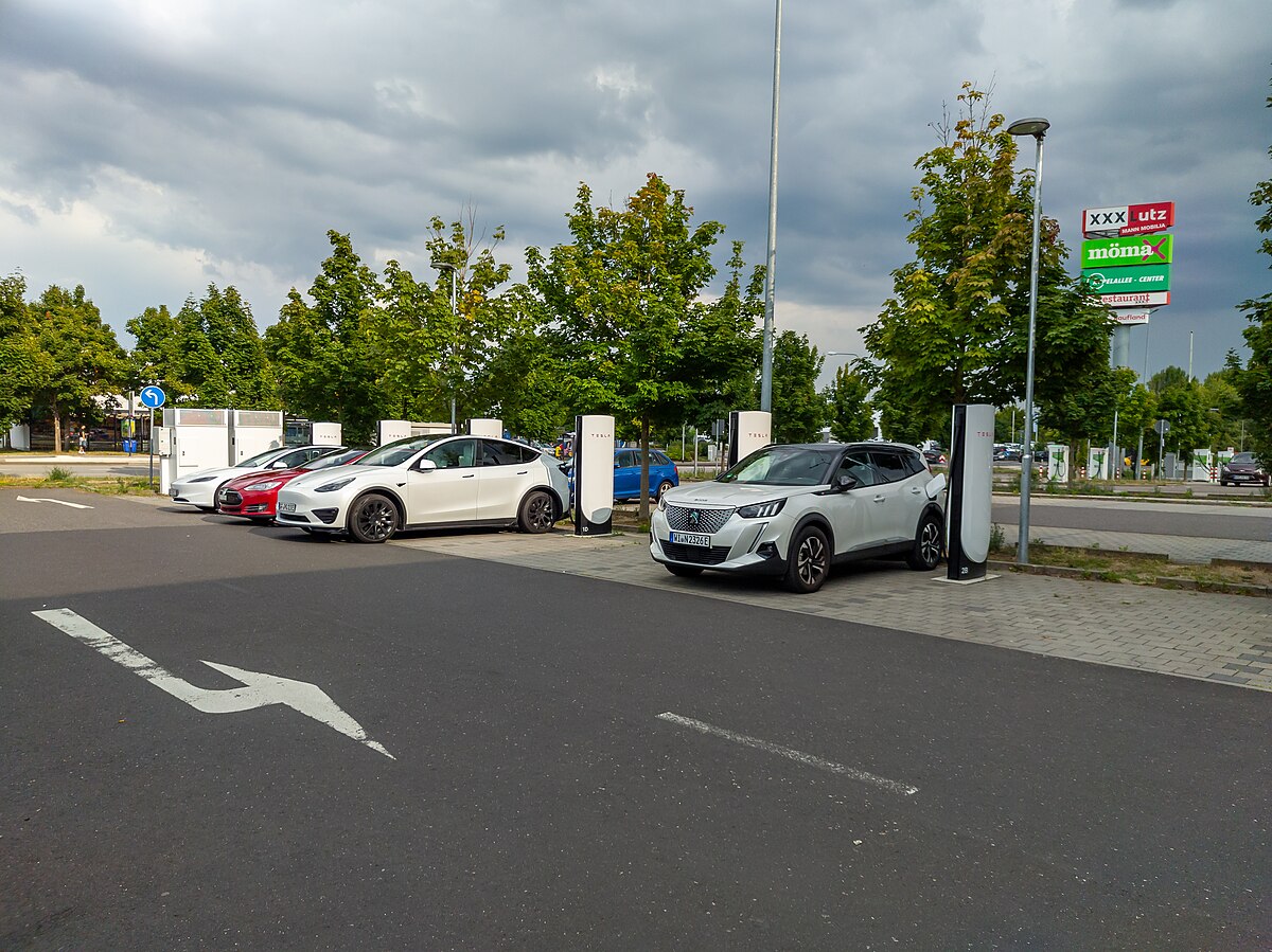 Modern EV charging infrastructure with multiple fast chargers for electric vehicles