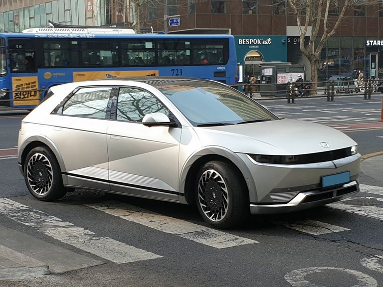 Hyundai Ioniq 5 exterior side view showing retro-futuristic design lines