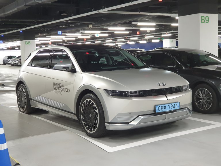 Hyundai Ioniq 5 NE Gravity Gold Matte exterior display showroom