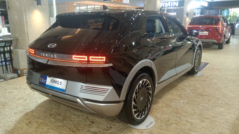 Hyundai Ioniq 5 rear three-quarter view showing pixel parametric tail lights design