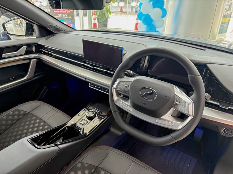 2026 Perodua QV-E interior dashboard with 10.25-inch infotainment display Malaysia