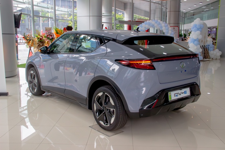 2026 Perodua QV-E rear three-quarter view showing sportback roofline