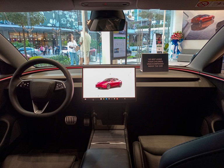Tesla Model 3 Highland Performance interior with 15.4-inch touchscreen and rear display