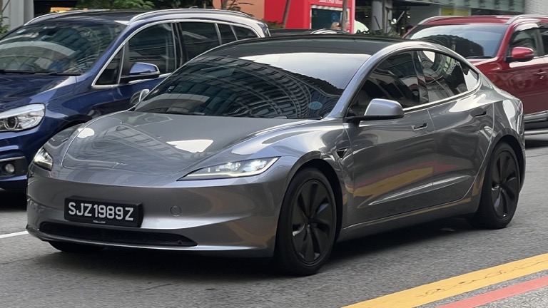 Tesla Model 3 Highland on road in Singapore