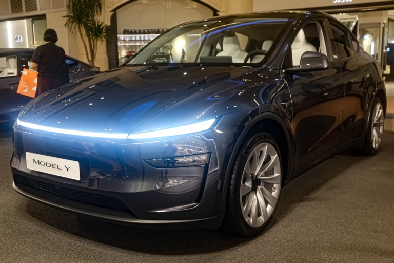 Tesla Model Y 2025 exterior front three-quarter view at Singapore showroom