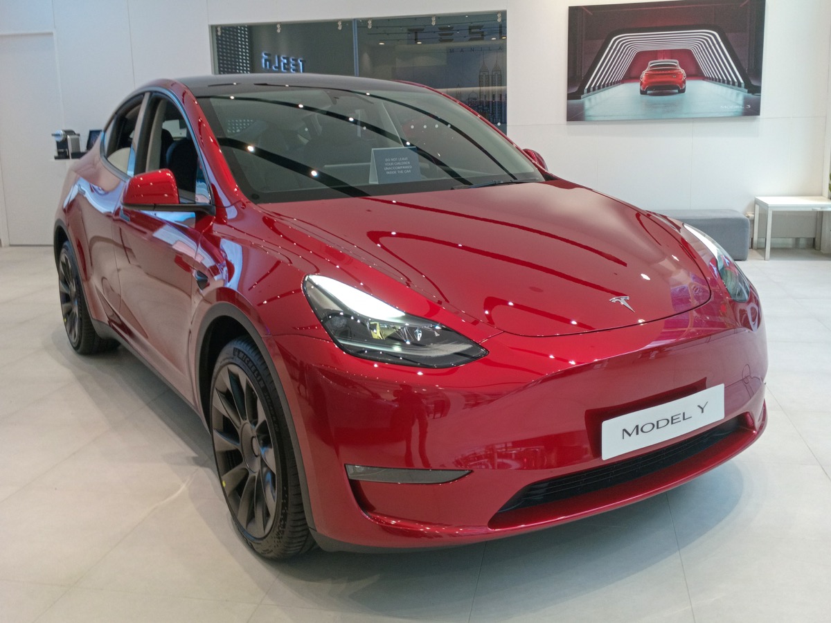 2025 Tesla Model Y front three-quarter view showcar Singapore no license plate