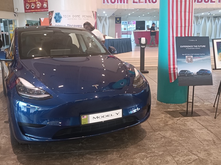 Tesla Model Y front three-quarter view at KOMTAR Penang Malaysia