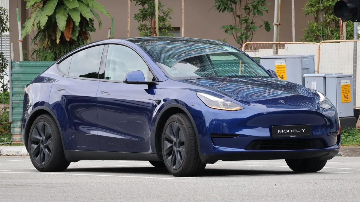 Tesla Model Y electric car Singapore front three-quarter view 2025