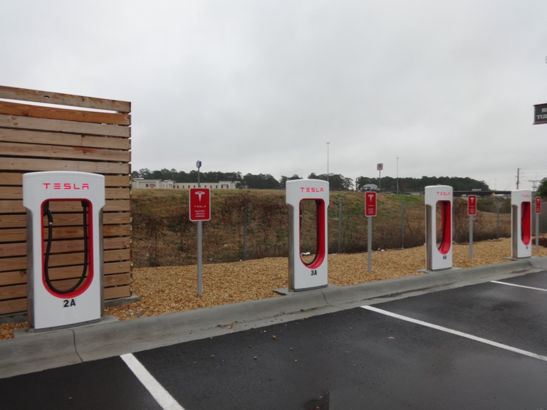 Tesla Supercharger station with multiple charging stalls