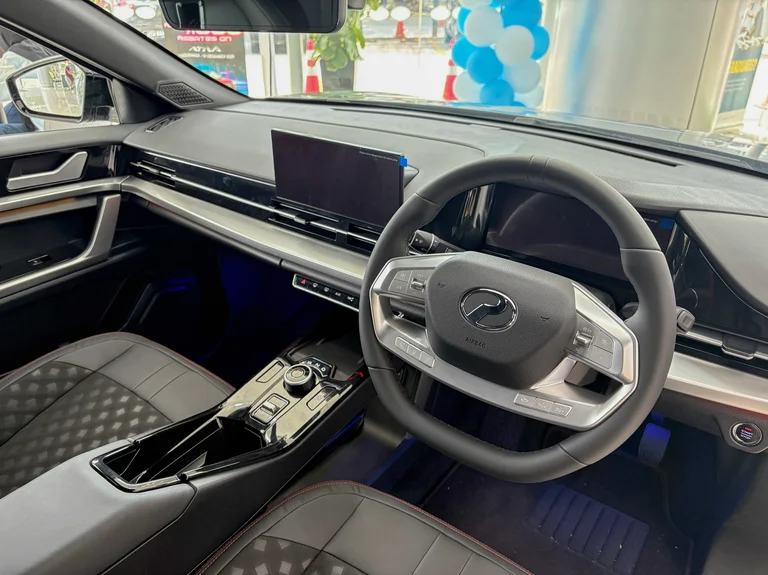 Perodua QV-E interior dashboard and infotainment 2026