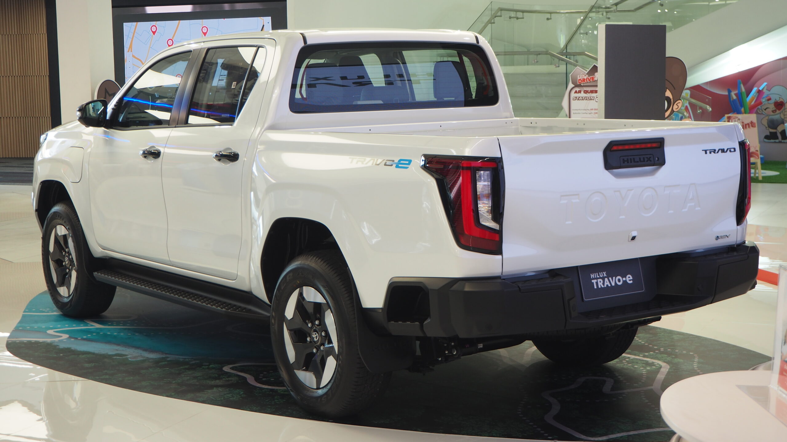 2025 Toyota Hilux Travo-e BEV rear view showing truck bed Bangkok Thailand